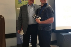 Buzz Mills presents Matt Andersson with winning $750 gift card for Rocket Launcher Raffle