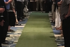 Steve Anderson tees up for the $10,000 putt