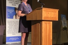 MM-speaking-at-auction-better