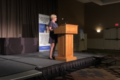 MM-speaking-at-auction